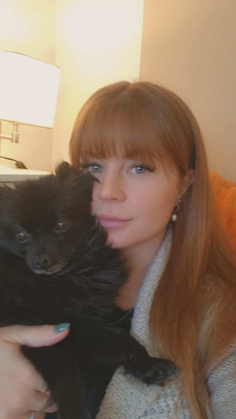 Woman holding a dog